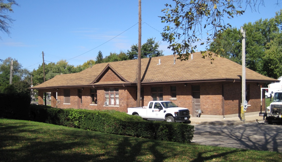 The retired Amtrak railroad station at the north end of the park, still owned by BNSF Railroad.